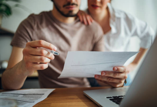 couple looking at bills