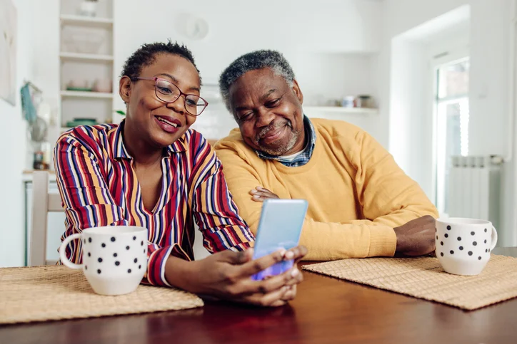 a couple reading on their phone