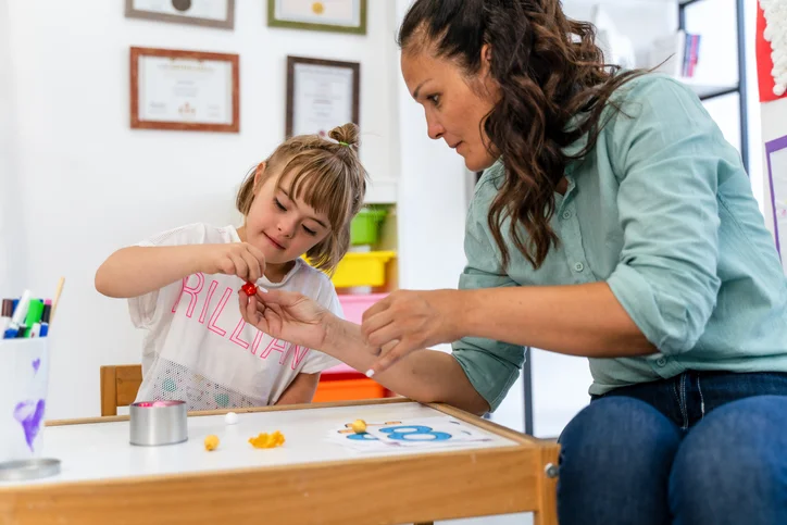 a mom playing with her disabled child