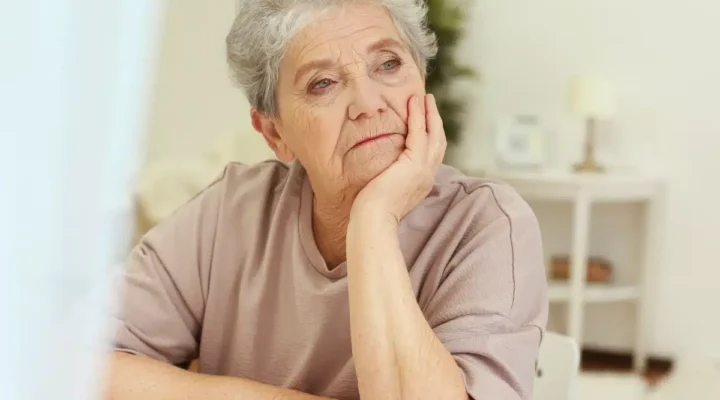 Woman looking sadly into distance