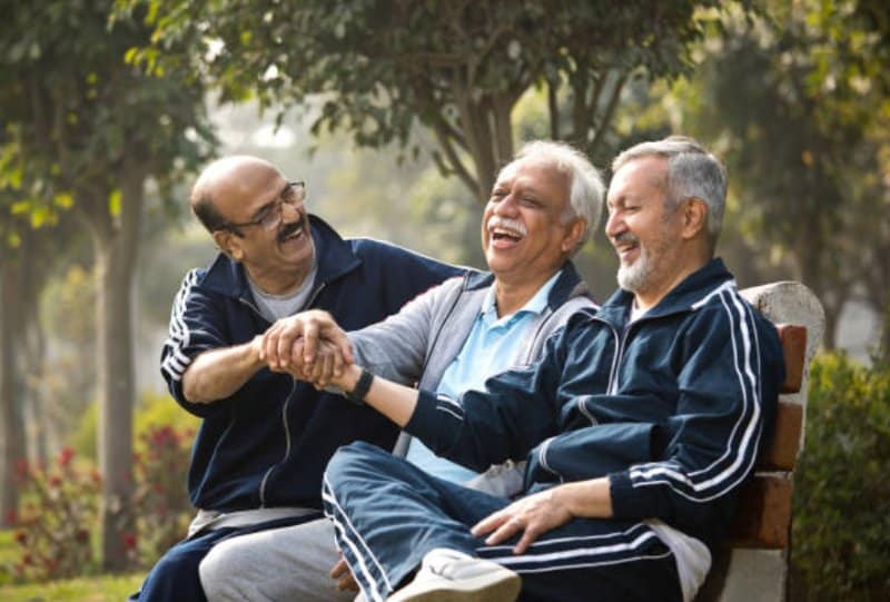 carers contingency planning image with three older men sitting on park bench