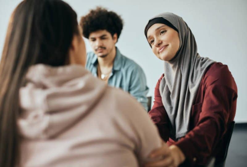 mental health nurse smiling at woman